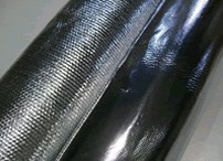 Tessuto tecnico scuro con rivestimento lucido